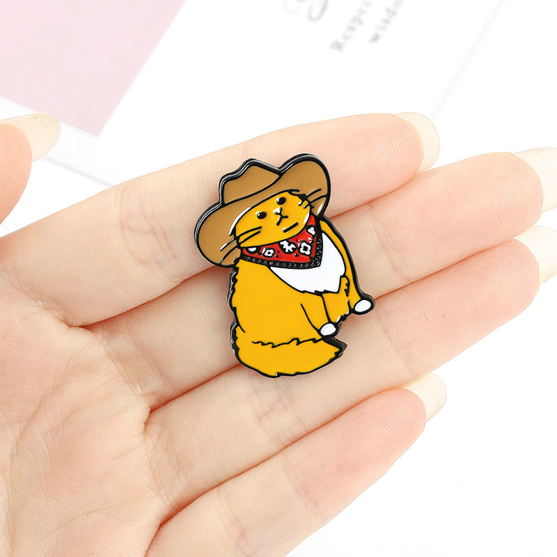 Orange cat enamel pins