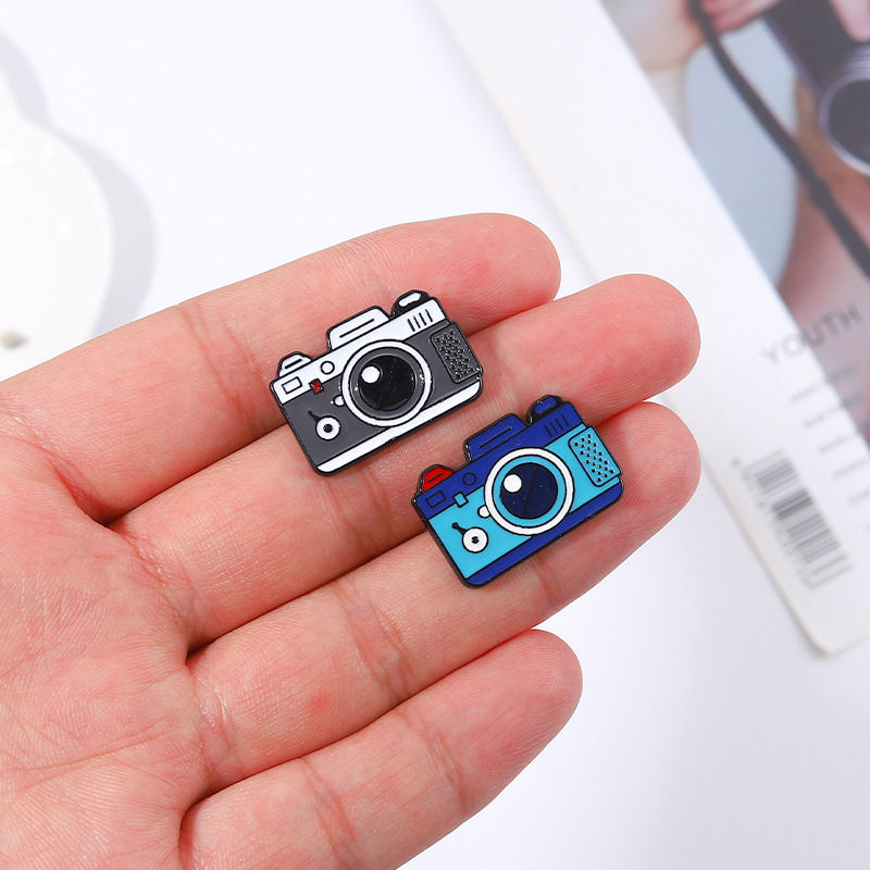 camera pin badge