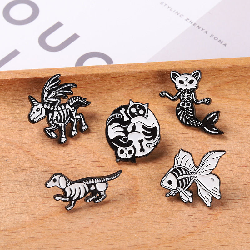 Skull skeleton enamel pin